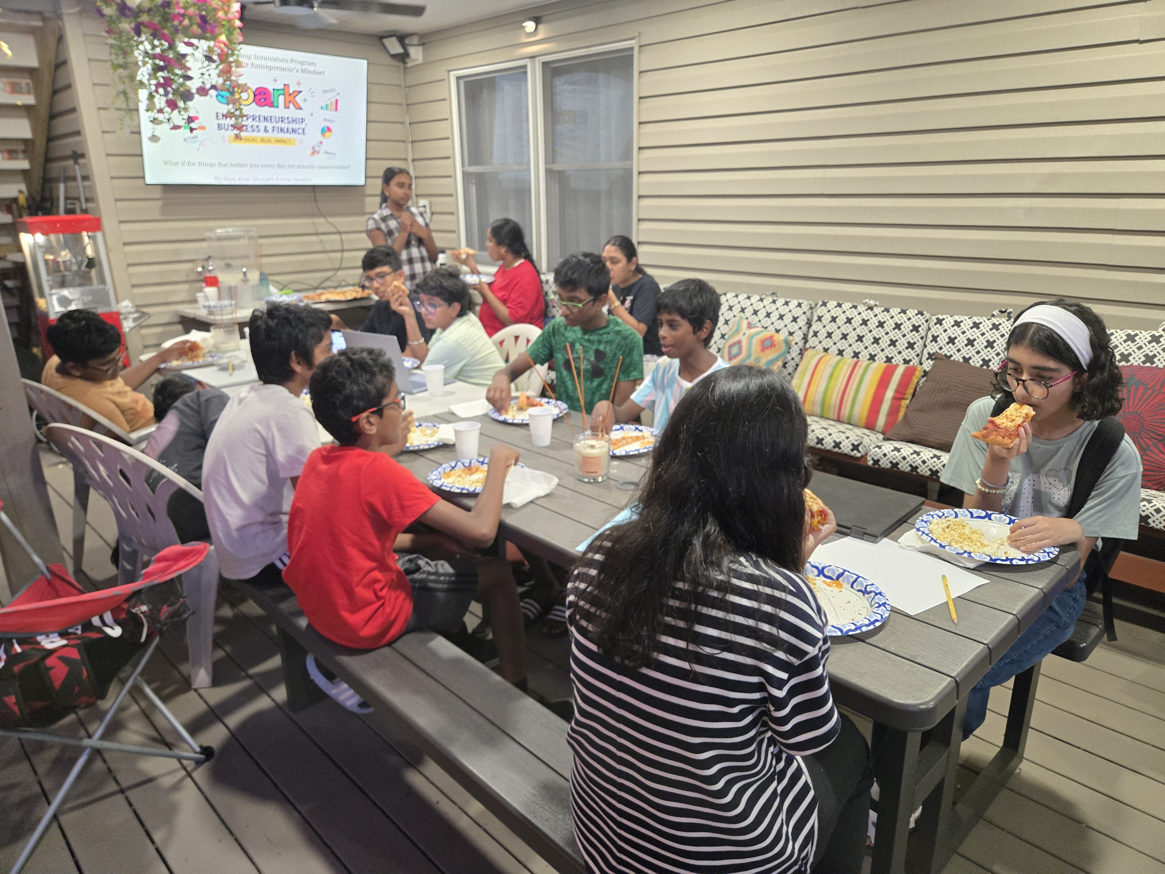 Students taking a pizza break during the workshop